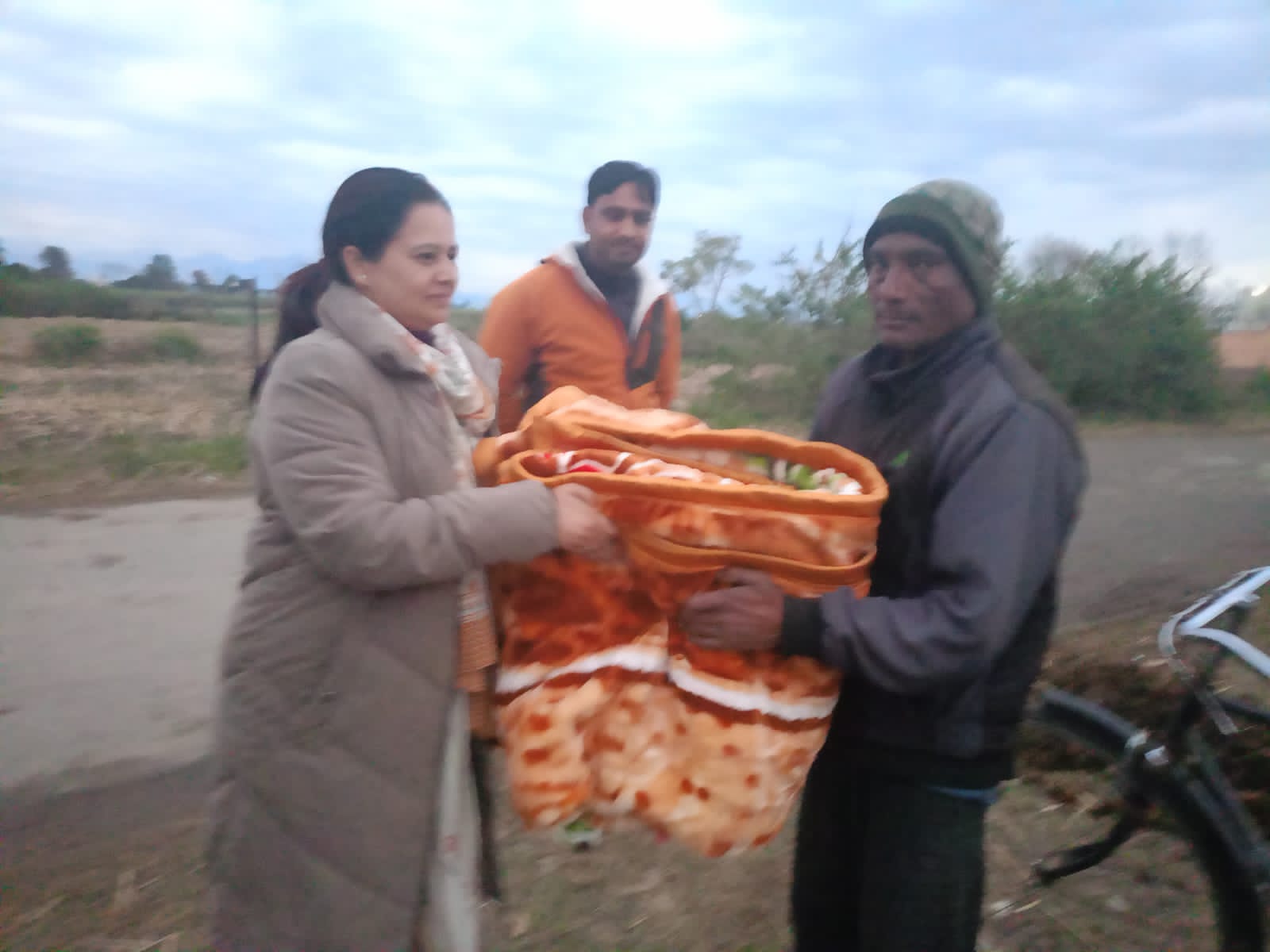 On the instructions of DM, the revenue team distributed blankets to the needy.