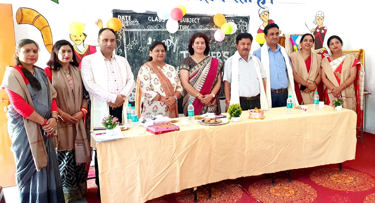 Teachers honored by covering them with shawls