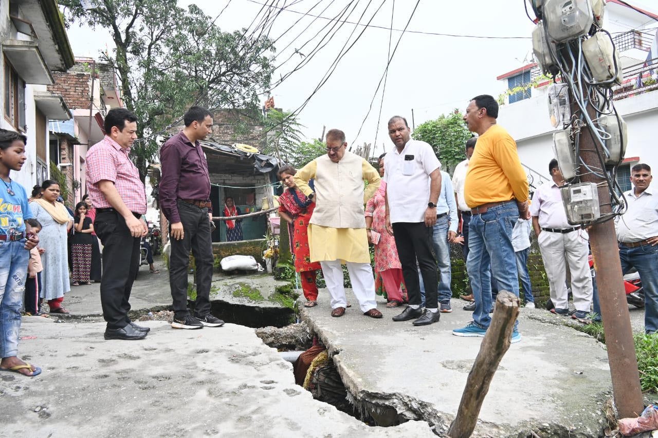Minister Ganesh Joshi doing on-site inspection of culvert and road damaged due to rain in Kandoli.