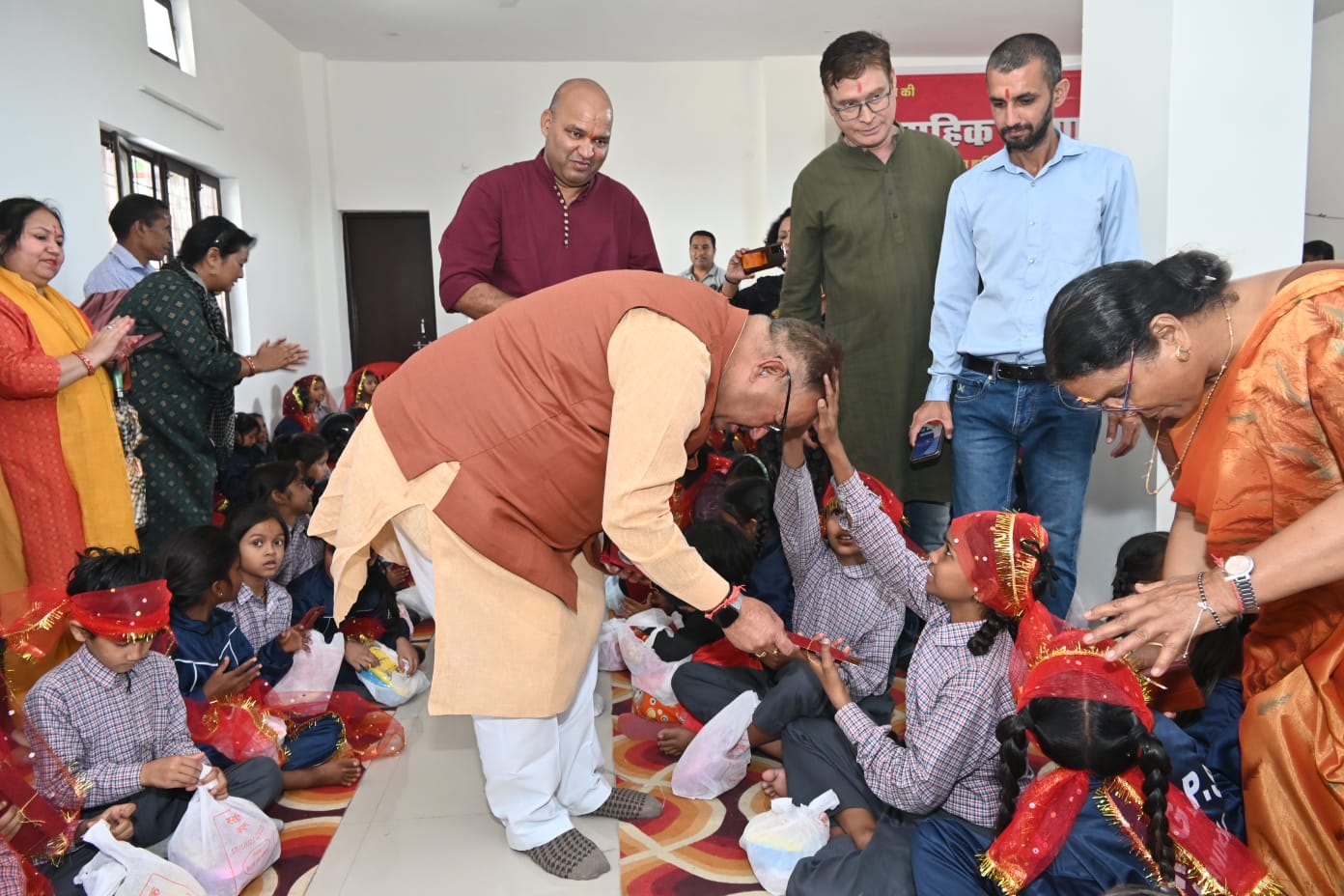 Minister Ganesh Joshi took blessings of Shakti Swarupa girls in the mass Kanya Puja program.