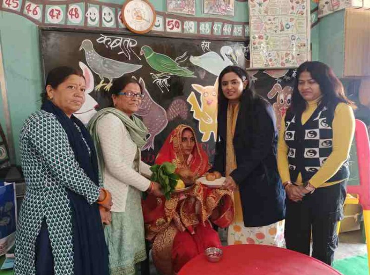 DM's wife distributed sanitary napkins to girls and women