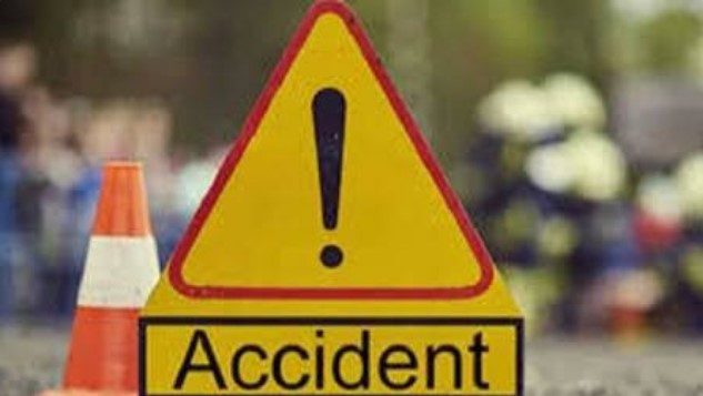 Two youths riding bike injured in collision with truck