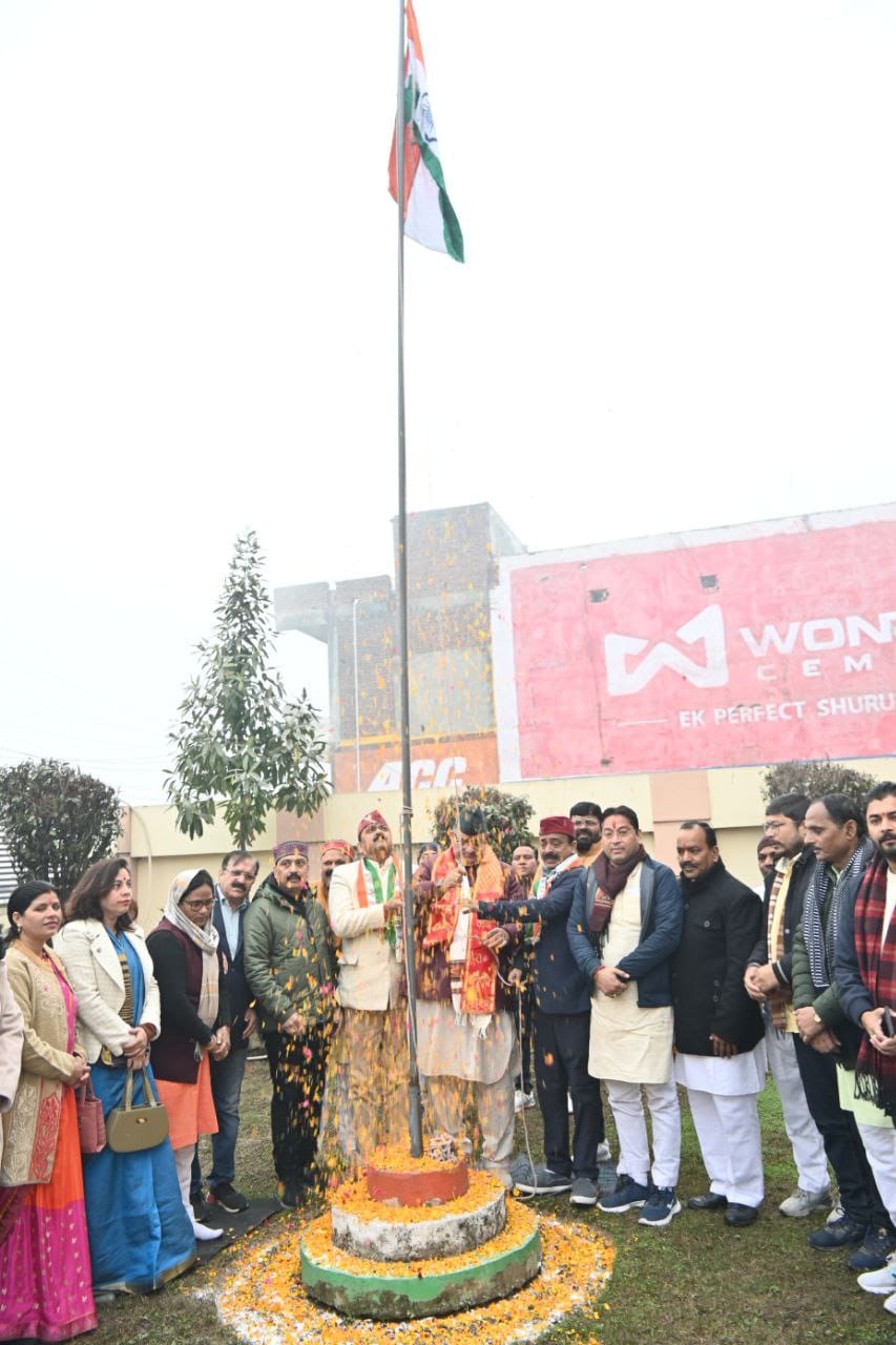 District in-charge minister Ganesh Joshi hoisting the flag at BJP's district office in Rudrapur.
